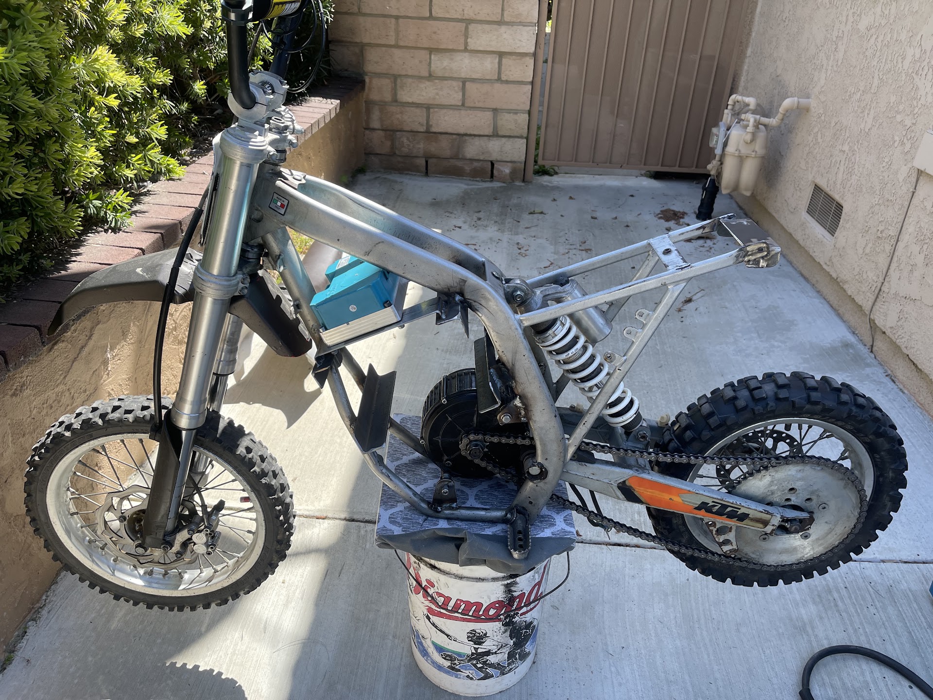 Electric dirt bike stripped for repair