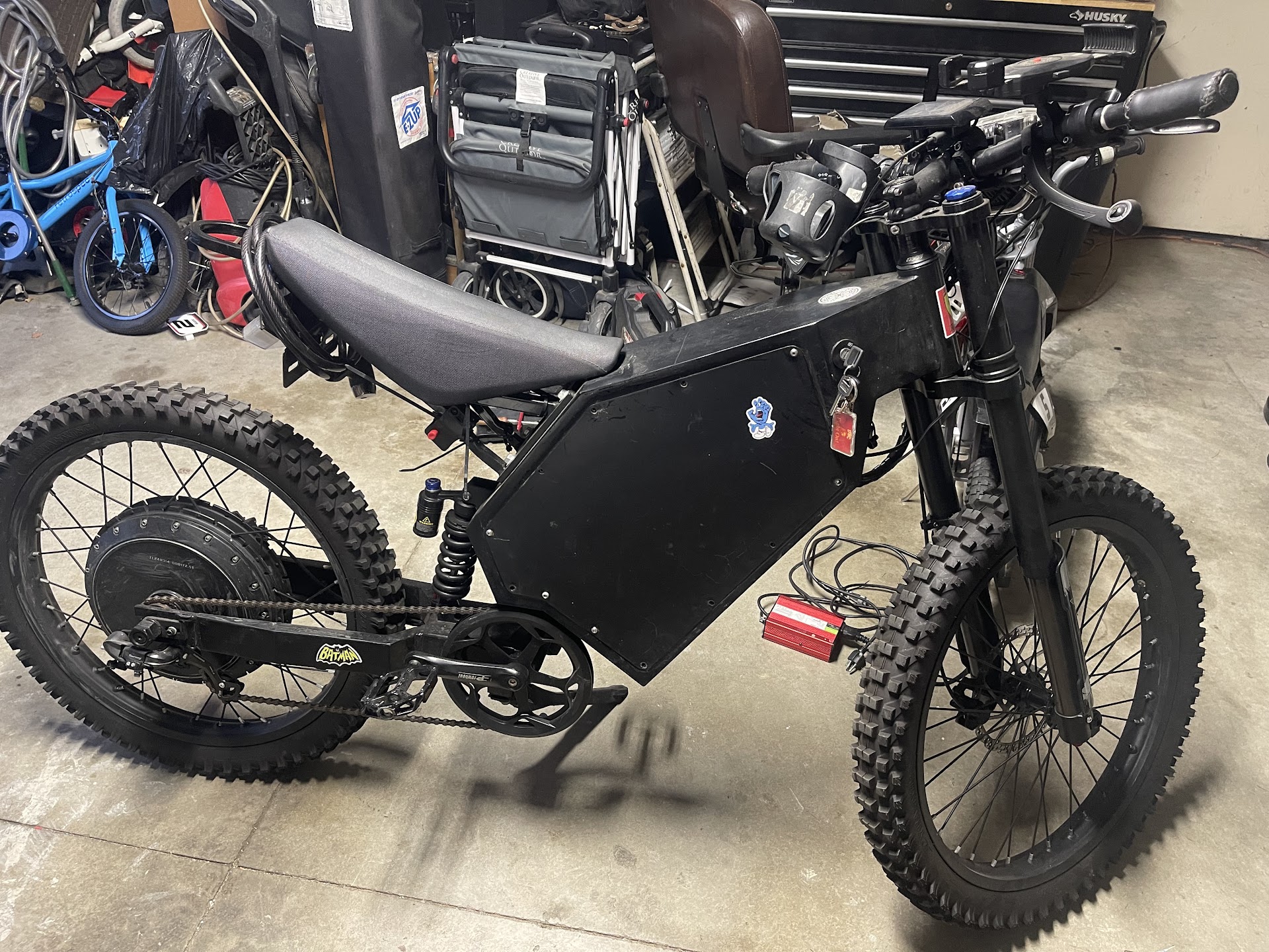 Custom black electric bike in the workshop