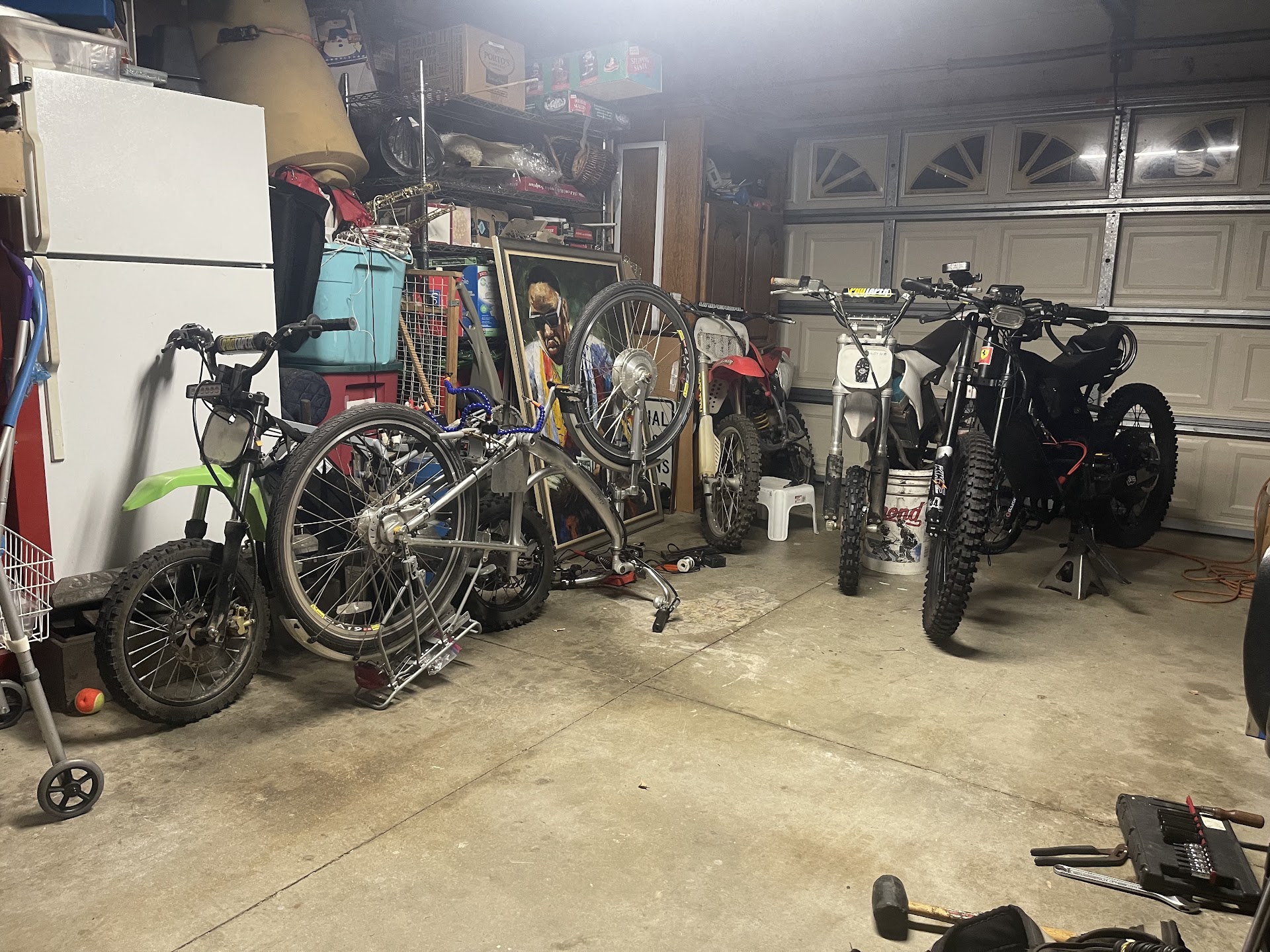 Customer electric bikes inside the Placentia garage